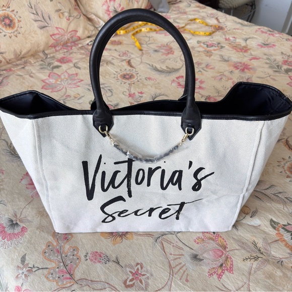 Victoria's Secret Handbags - Victoria's Secret Cream Tote with Black Accents